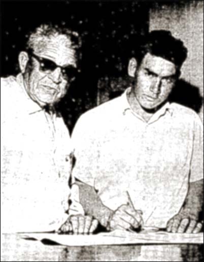 Claude Lambert signs